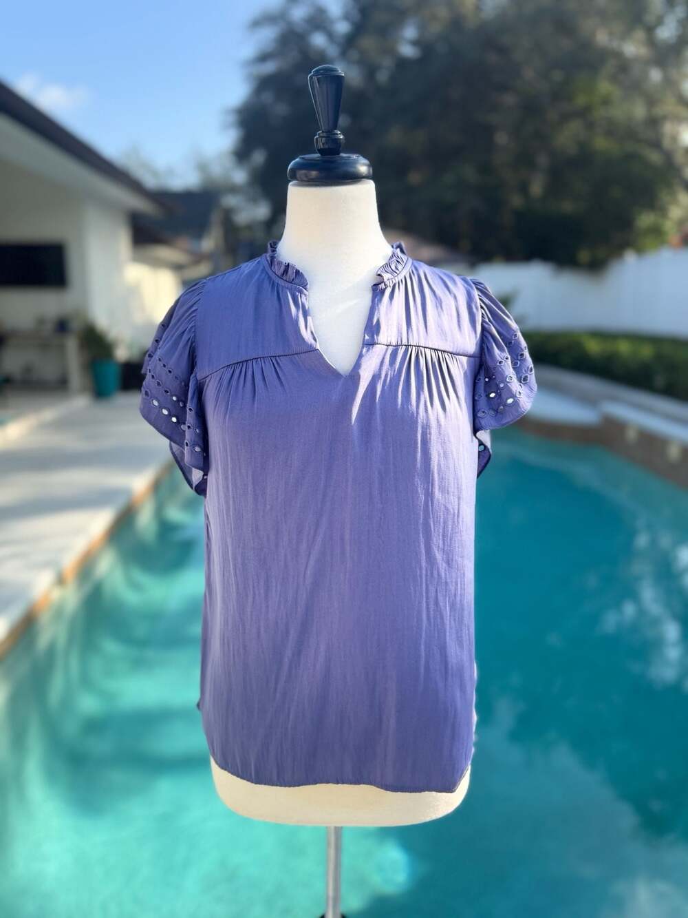 Daniel Rainn Short Sleeve V-Neck Blouse with Eyelet Ruffle Detail